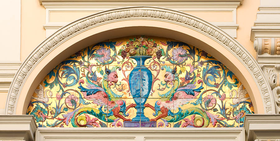 Another Belle Époque decoration in Avenue de Grande Bretagne. At the Universal Exposition of Vienna, in 1873, Monaco was remarked for its ceramics, introduced by Mrs. Marie Blanc , wife of the Casino director. Actually, they had been made in the Pyrenees, not in Monaco, by the ceramics maker Fischer. The success was such, that he was called in Monaco to direct the "Monte Carlo Artistic Ceramics Factory".